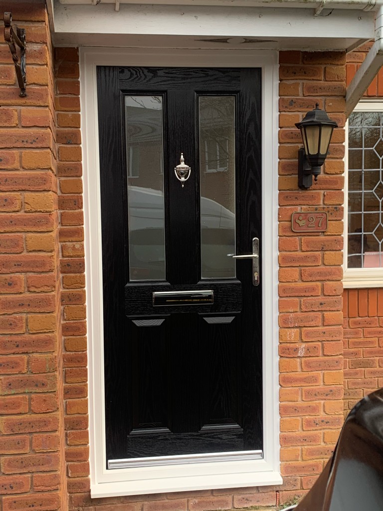 Brick house with windows and door