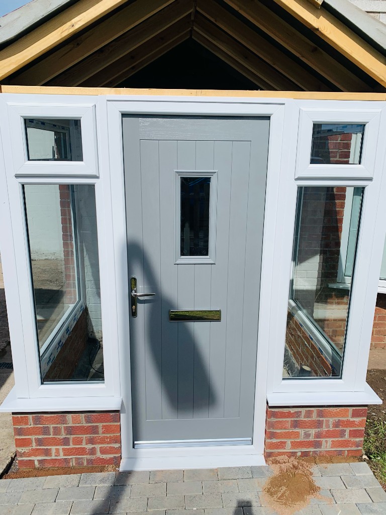 Brick house with uPVC door and window