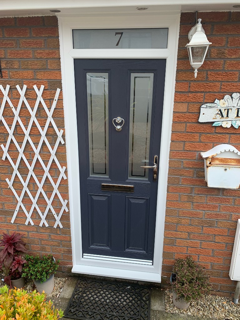 French doors and windows on brick