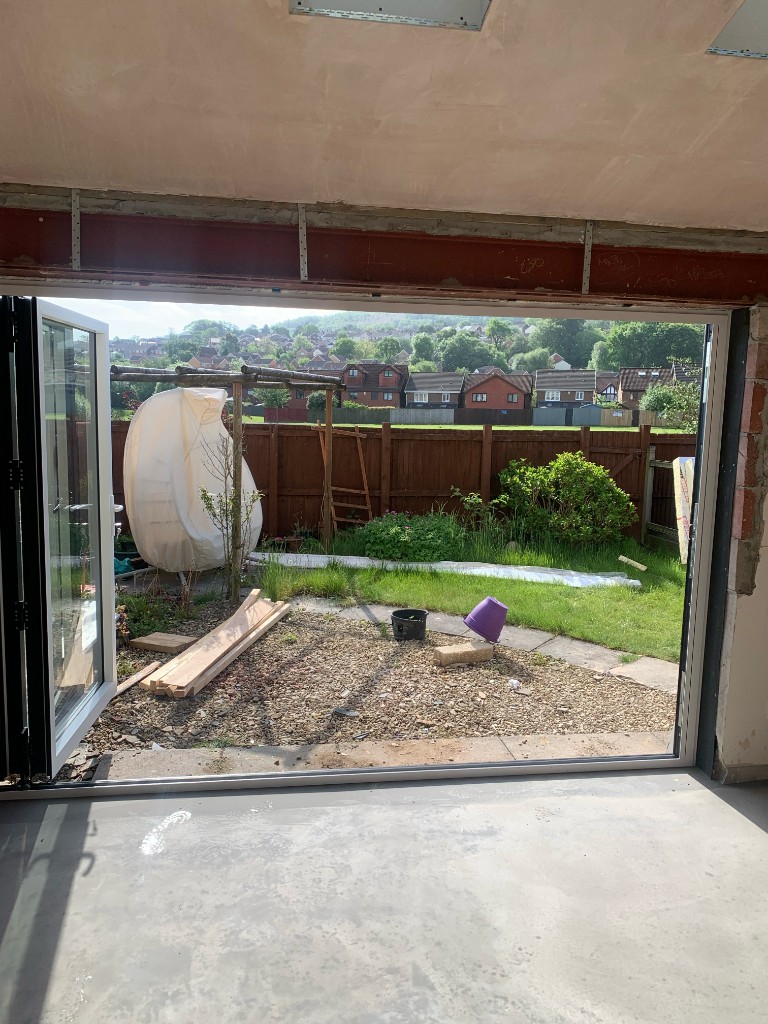 Conservatory extension with sliding doors
