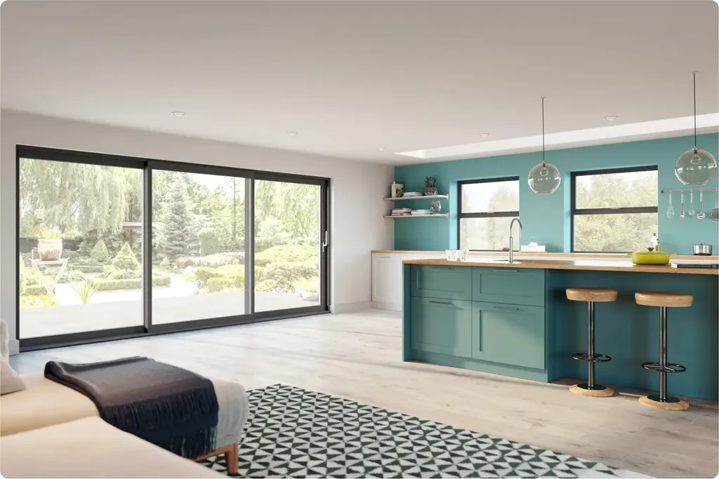 Open-plan room with sliding doors and kitchen