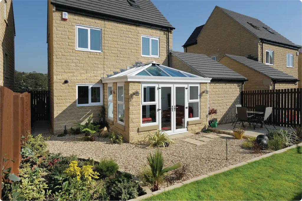 Living room with dark-framed window and sliding doors